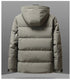 Back view of light beige puffer jacket showing quilted design, hooded collar and subtle brand embroidery at bottom with technical construction