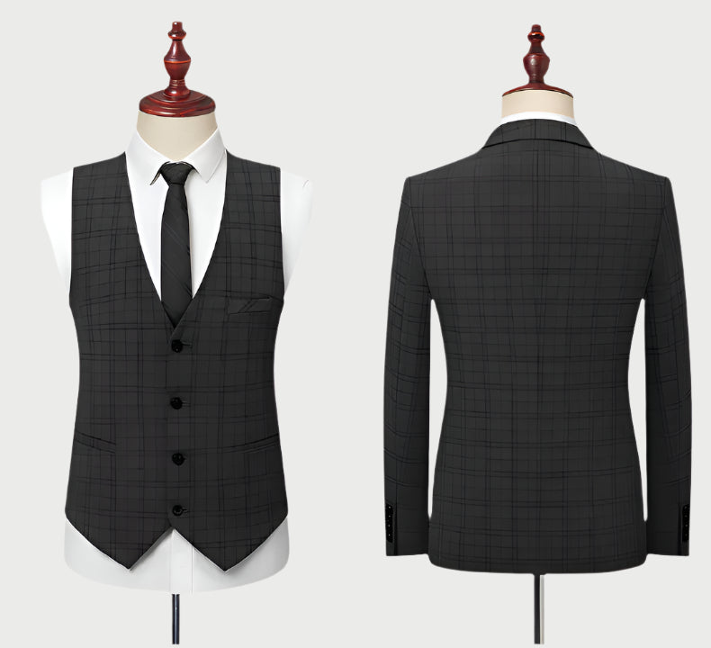 Front and back view of dark gray plaid waistcoat and suit jacket on mannequins with black tie