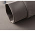 Close-up of gray cotton sleeve cuff showing ribbed texture and clean finishing