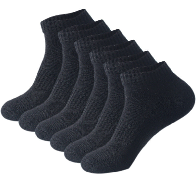 Black ankle socks pack – A set of six ribbed black ankle socks, displayed in a row to highlight their minimalist and comfortable style