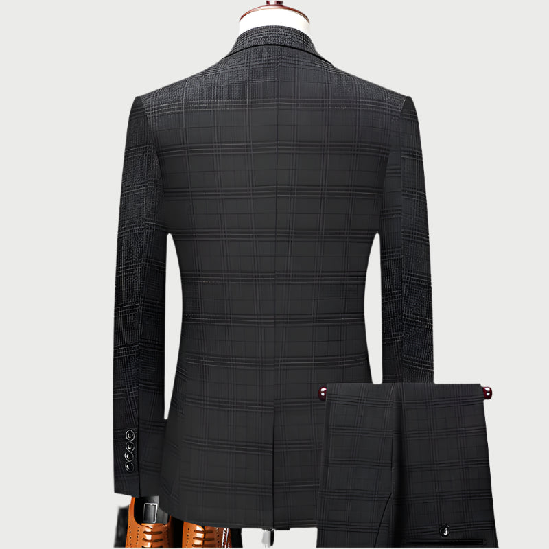 Back view of charcoal plaid suit jacket and matching pants showing detailed windowpane pattern