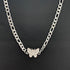 Silver chain necklace with rhinestone butterfly charm displayed on black leather background