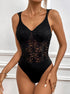 Black floral lace bodysuit with mesh midsection and solid bottom, styled as lingerie.