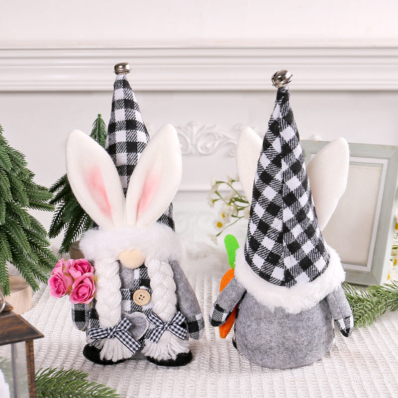 Front and back view of two Easter bunny gnome plush dolls in black-and-white plaid outfits, one holding pink roses and the other a carrot.