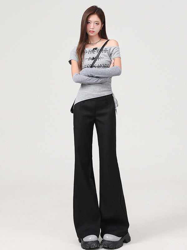 Front view, full-body shot of black flared trousers with tailored wide-leg silhouette.