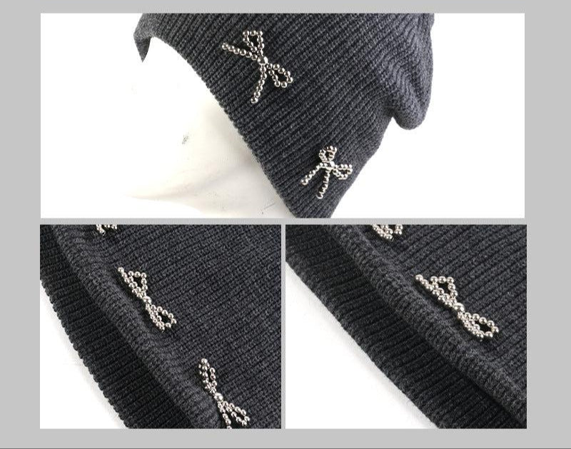 Detailed close-up of a dark gray beanie showing pearl-studded bow decorations from multiple angle
