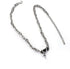 Product photo of silver chain necklace laid flat with star charm