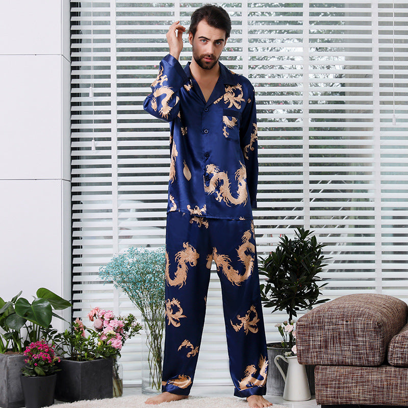 Navy blue silk men's pajama set with golden dragon print, showcasing classic button-up style and full-length pants