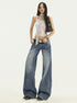 Front view full-body shot of blue wide leg jeans with vintage wash and low rise