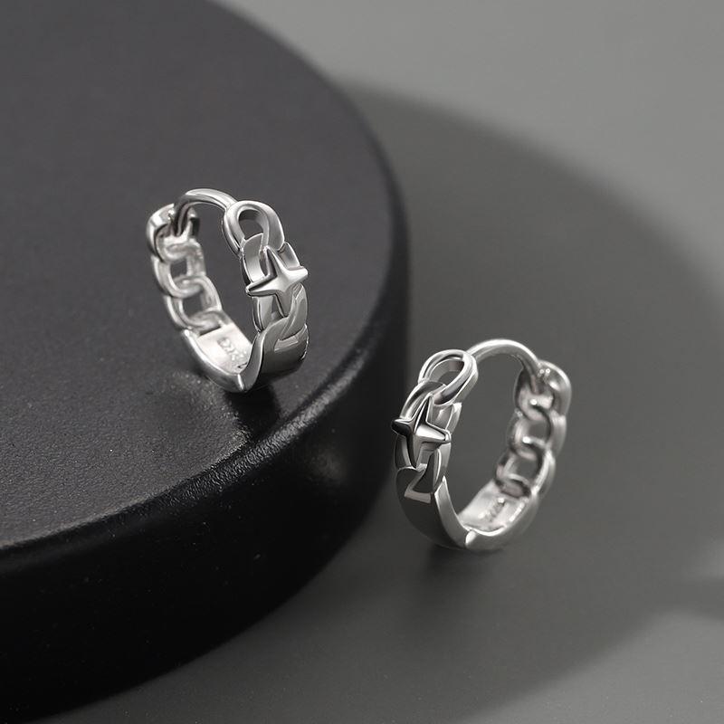 Sterling silver chain-style hoop earrings on black platform, close-up view.