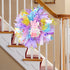 Festive Easter wreath with a "Welcome" bunny sign hanging on a staircase railing, bright and cheerful.