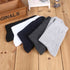 Assorted cotton crew socks in multiple neutral colors, showcasing versatile sock collection