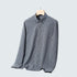 Blue and cream tattersall check shirt on wooden hanger. Classic country-style pattern in soft flannel