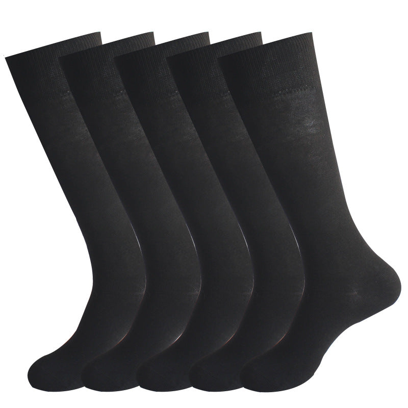 Five pairs of black dress socks with ribbed cuffs displayed against white background