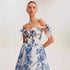 Off-shoulder blue and white floral organza dress with sweetheart neckline and voluminous midi skirt