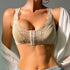 Beige front-closure bra with wide lace trim and center hook detail, styled with white blazer