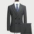 Charcoal gray double-breasted pinstripe suit with blue tie on mannequin, showing classic tailoring