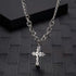 Silver chain necklace with rhinestone-studded cross pendant