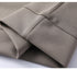 Detail of folded gray cotton fabric showing seam construction and ribbed edges