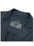 Close-up of navy blazer's textured fabric showing detailed waffle-weave pattern characteristic of GFJFRIN suits
