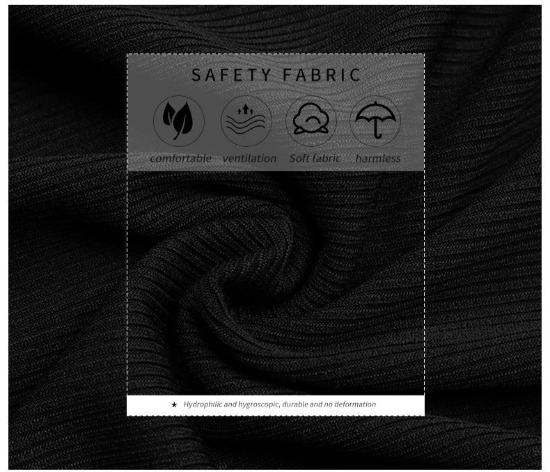 Close-up of black fabric showing safety features: comfortable, ventilated, soft, and harmless material