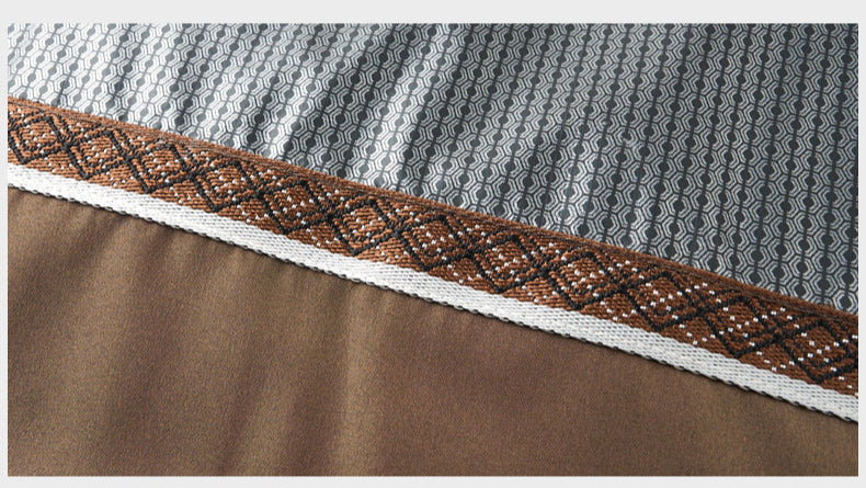 Detailed shot of the coat's interior lining, showcasing a geometric pattern and brown trim for added style and durability