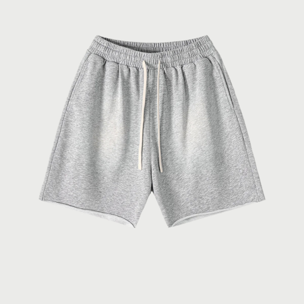 Light heather gray drawstring shorts with elastic waistband displayed flat against light gray background.