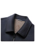 Close-up of dark gray wool jacket collar showing detailed stitching and lining