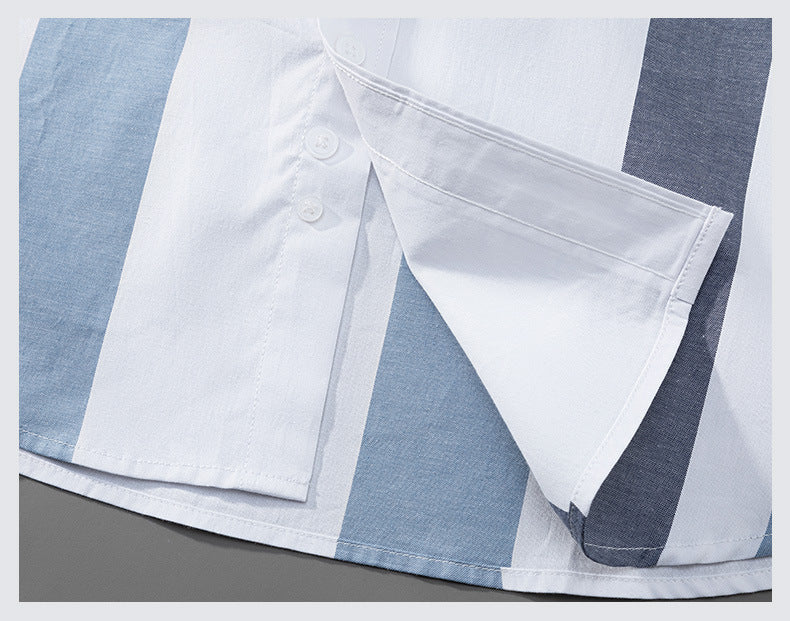 Shirt hem detail showing side vent construction and quality finishing on plaid pattern