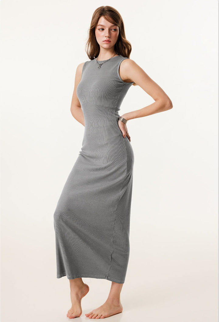 Side view of medium grey ribbed sleeveless bodycon maxi dress, showing the slim and graceful fit.