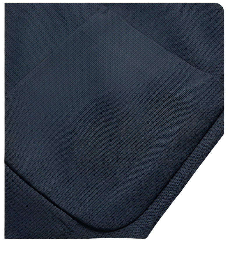 Close-up of navy blazer's sleeve cuff showing the fine textured material and clean finishing of GFJFRIN tailoring