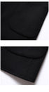 Detail of black wool blazer pocket construction showing clean stitching and rounded corner design