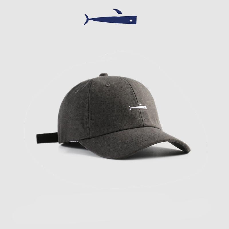 Gray baseball cap with white embroidered fish logo and curved brim