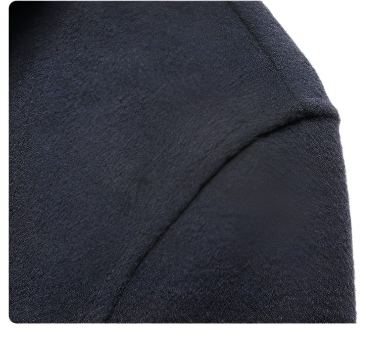 Extreme close-up of navy wool fabric showing textured surface and fine detailing