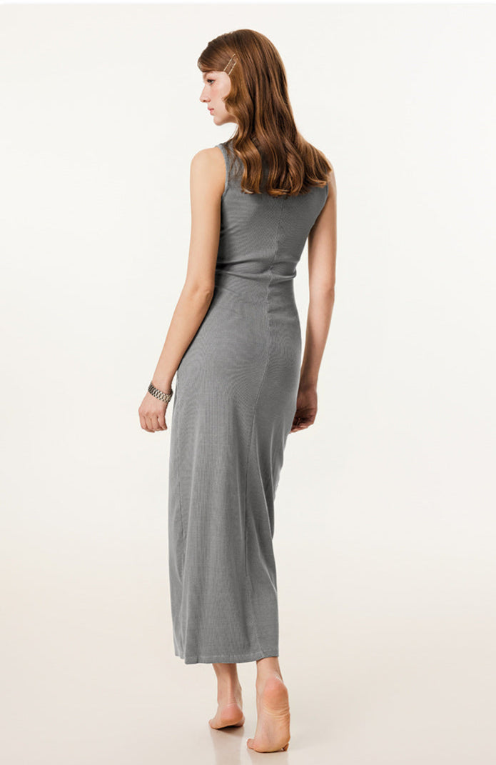 Rear view of medium grey bodycon maxi dress, emphasizing the seamless fitted design.