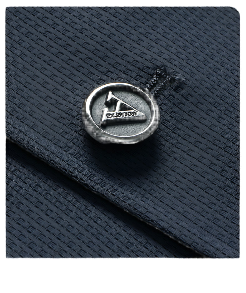 Decorative metal button on GFJFRIN blazer featuring triangular logo and 'FASHION' text embossed in silver finish