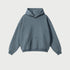 Blue-gray oversized hoodie with kangaroo pocket on neutral background