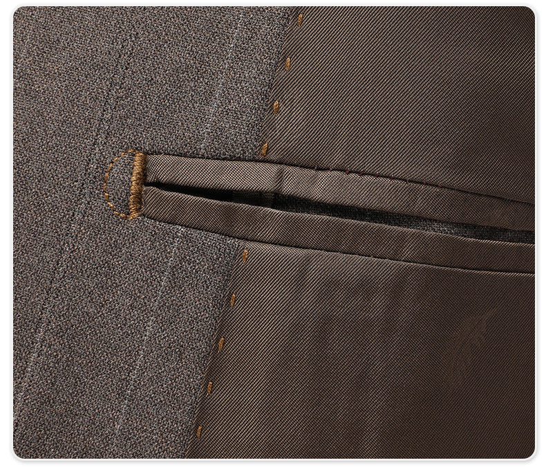 Close-up of gray suit trouser pocket with interior construction visible