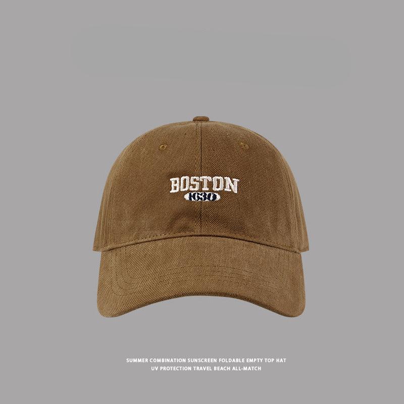 Khaki brown Boston baseball cap featuring white embroidered logo, casual beach and travel headwear