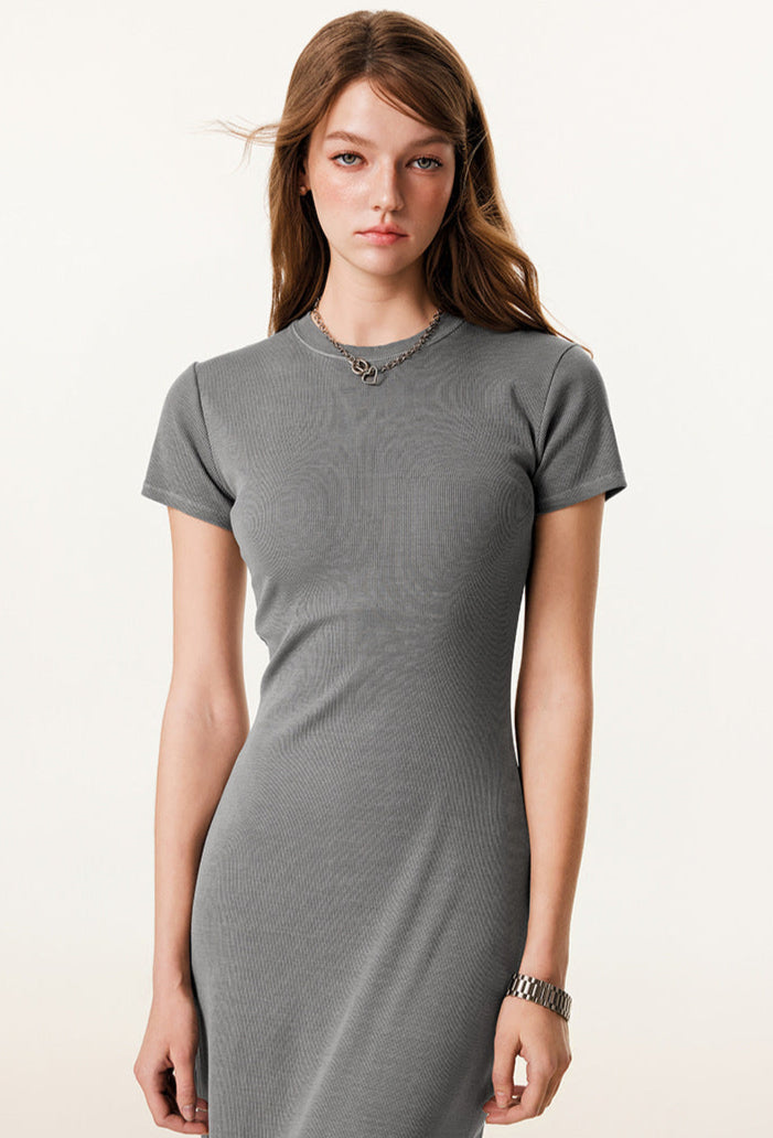 A detailed shot of the light fray maxi dress, highlighting the ribbed fabric and round neckline.