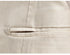 Detailed view of welt pocket construction on beige suit trousers