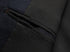 Interior view of blazer pocket construction showing detailed stitching and fabric lining