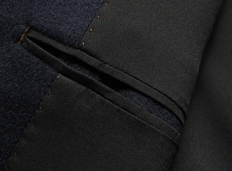 Interior view of blazer pocket construction showing detailed stitching and fabric lining