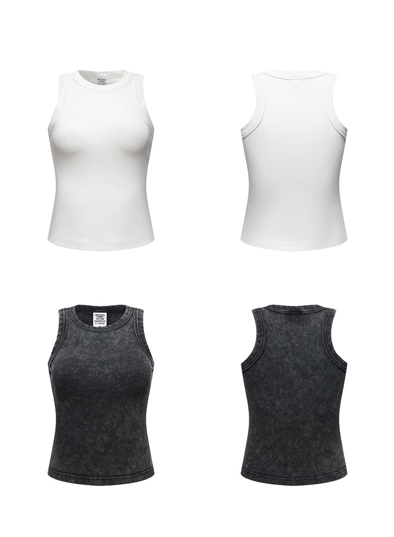 White and black fitted tank tops displayed front and back, showing sleeveless racerback design and slim silhouette for layering