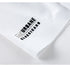 Close-up of URBANE CLASSICAND logo branding on sleeve of white polo shirt