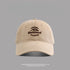 Light khaki baseball cap with "Outstand" and mountain logo in brown embroidery
