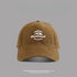 Dark brown baseball cap featuring white "Outstand" and mountain logo embroidery