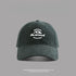 Deep green baseball cap with white "Outstand" mountain embroidery
