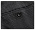 Detail of back pocket with button closure on charcoal plaid dress pants