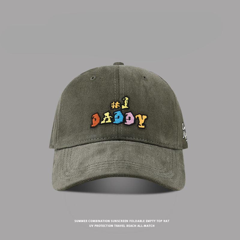 Dark gray '#1 Daddy' embroidered baseball cap with curved brim and washed cotton fabric for a retro look